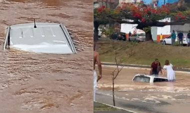 Carro cai em cratera e afunda após rompimento de adutora em avenida