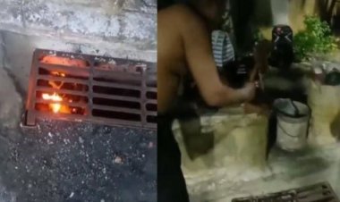 Homens preparam churrasco em bueiro e viralizam nas redes sociais; infectologista alerta