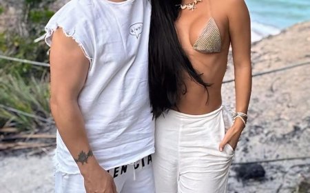 Belo aparece com mulher misteriosa enquanto namorada está confinada em ‘A Fazenda’