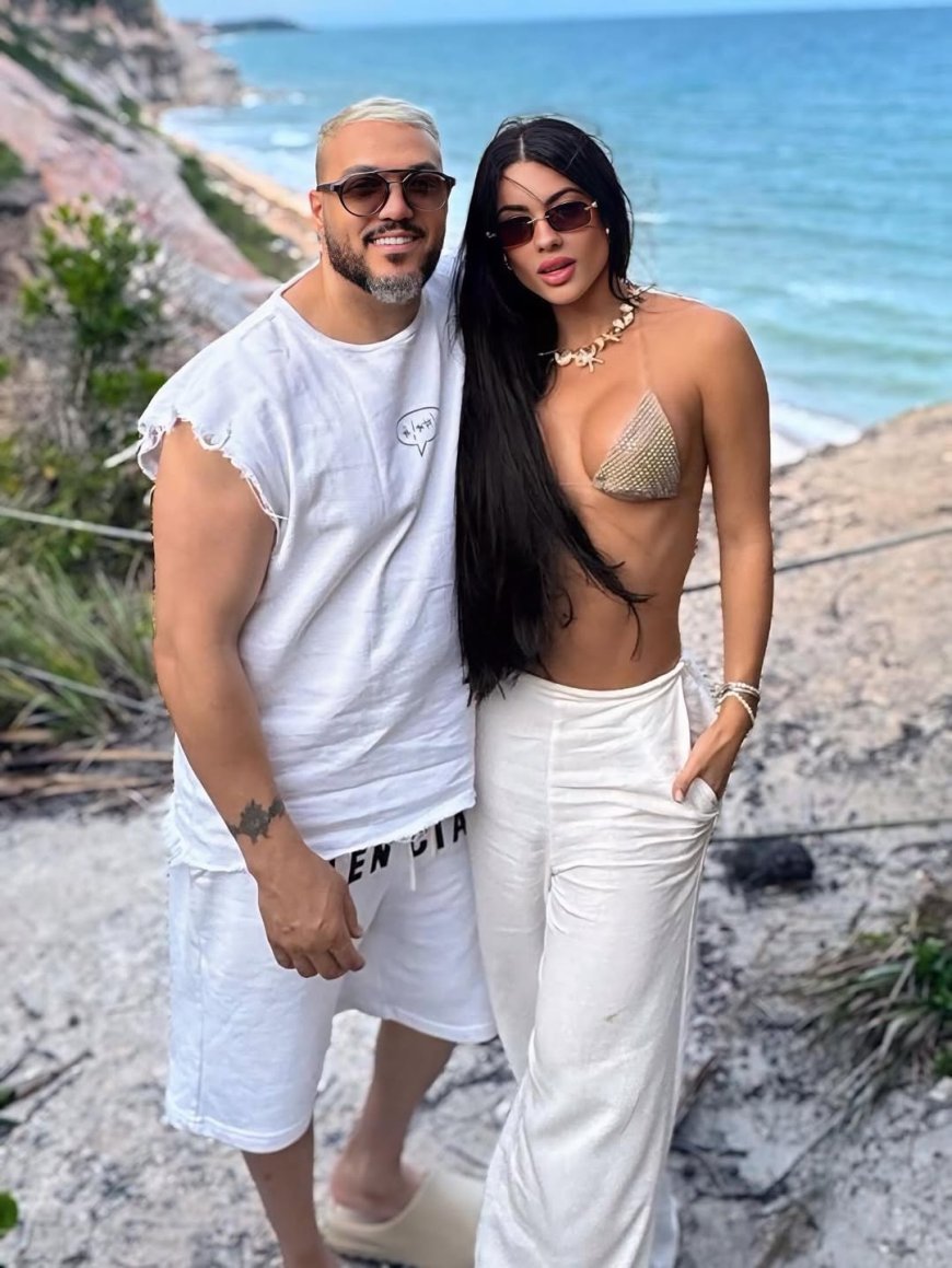 Belo aparece com mulher misteriosa enquanto namorada está confinada em ‘A Fazenda’